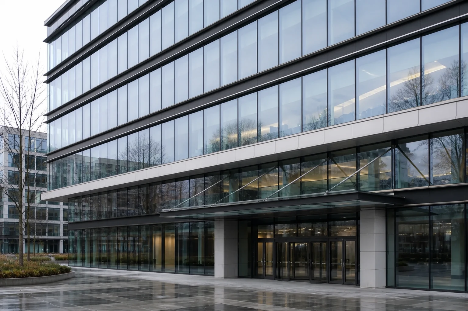 Glazed business centre entrance and structural facade detail